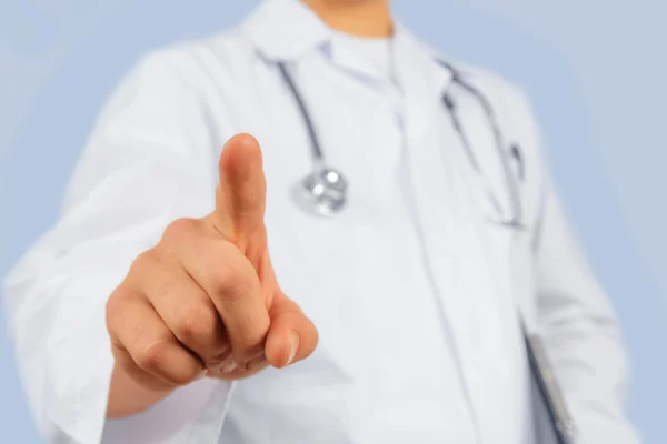 Man doctor is touching something in the air — Stock Photo, Image