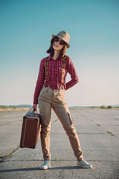 Hipster woman with suitcase — Stock Photo, Image