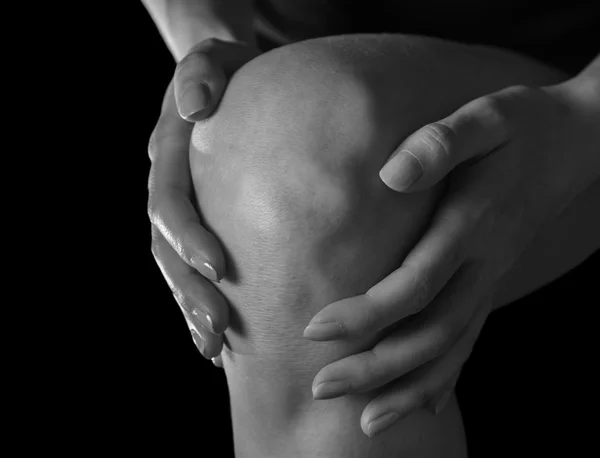 Pain in the female knee — Stock Photo, Image