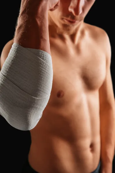 Bandaged elbow joint — Stock Photo, Image