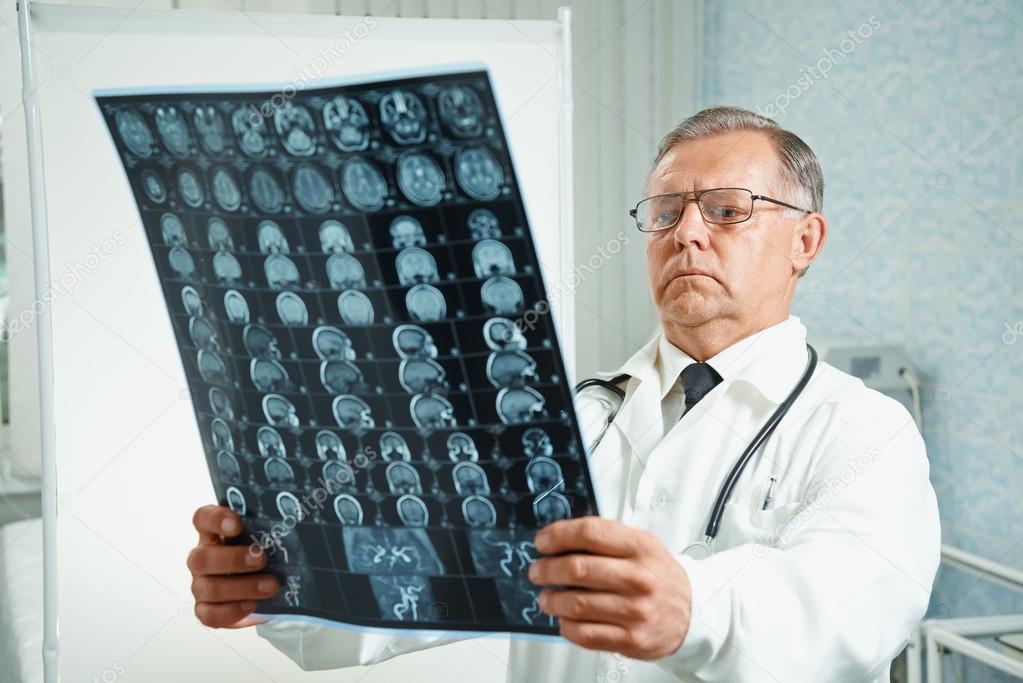 Doctor examines MRI image