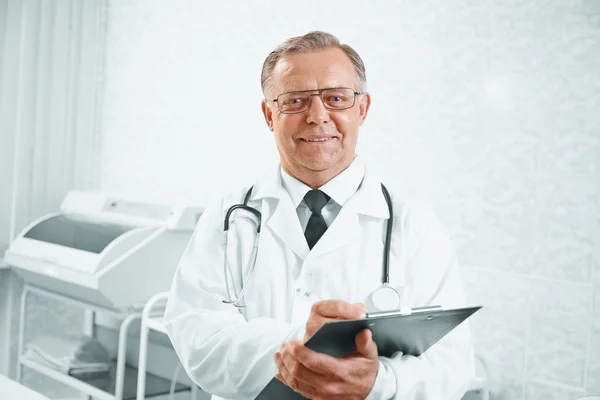 Smiling senior doctor — Stock Photo, Image