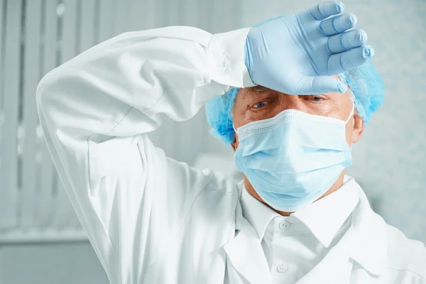 Tired older man surgeon — Stock Photo, Image