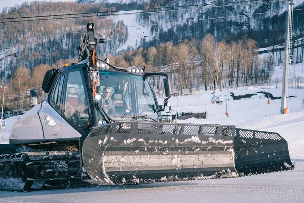 Close up of the Snowcat Prinoth Caterpillar vehicle for maintenance of mountain ski slopes. — Stock Photo, Image