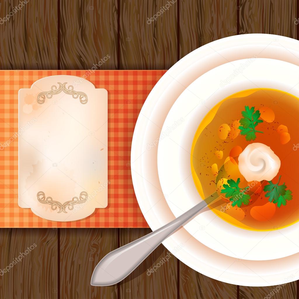A plate of soup on a wooden table.