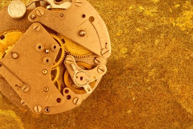 Metalik altın arka plan clockwork ile