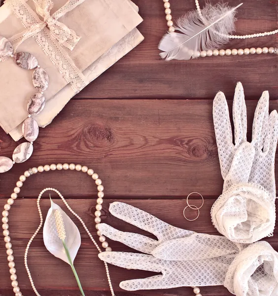 Wedding concept with women's gloves and a flower Spathiphyllum — Stock Image Wedding concept with women's gloves and a flower Spathiphyllum Royalty Free Stock Photos