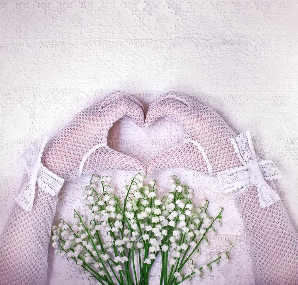 Hands in white wedding gloves — Stock Photo, Image