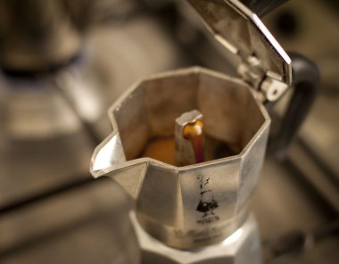 Coffee brewing in a percolator clipart