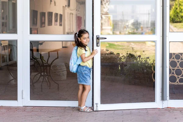 First day of a new school year, the girl feeling anxious going back to school.