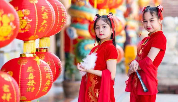 Asian Two Girl Wearing Red Traditional Chinese Cheongsam Decoration Holding — Stock Photo, Image