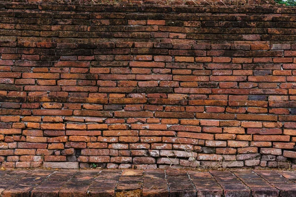 Old Abstract Brick Wall Large Orange Brick Wall Background Texture ancient buddhist temple in Thailand for pattern Background With Copy Space For design