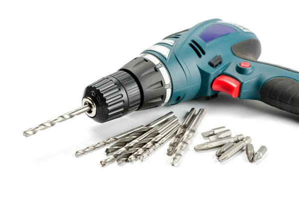 Drill-screwdriver with drills and nozzle — Stock Photo, Image