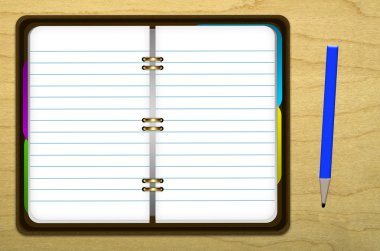 defter kalem mavi ile ahşap masa