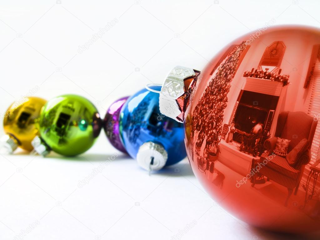 Shiney Christmas Ornaments Reflects a Christmas Tree and Holiday Decorations