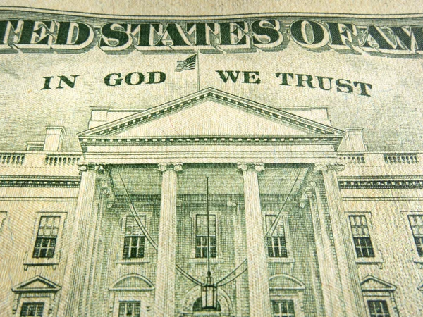 Dólar estadounidense en Dios Confiamos Inscripción destacado — Foto de Stock
