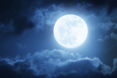 Dramatic Nighttime Clouds and Sky With Large Full Moon clipart