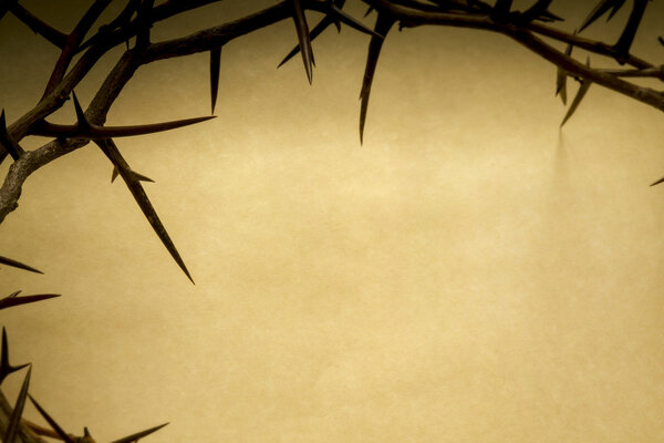 Crown Of Thorns On Parchment Background Represents Jesus Crucifixion on Good Friday