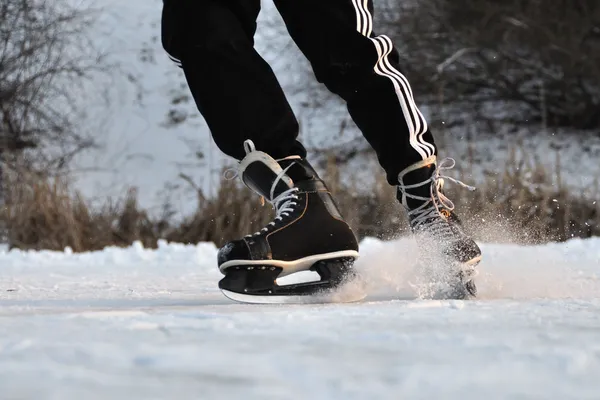 Closeup aggressive ice skating — Stock Photo, Image