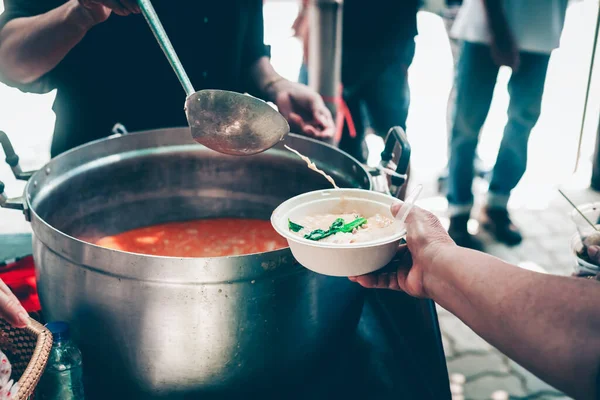 Free food: The human need for food is assisted by volunteers.