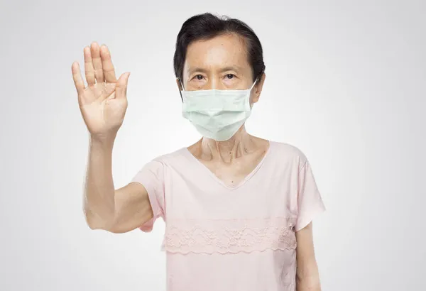 Old Asian Woman Wearing Mask Shows Forbidden Pose White Background — Stock Photo, Image