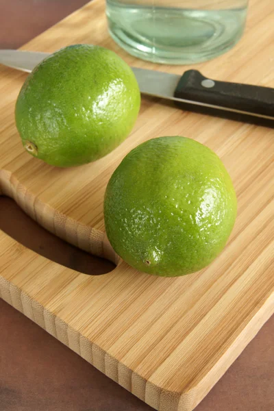 Fresh tangy green limes — Stock Photo, Image