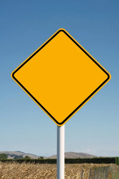 Blank yellow diamond road sign — Stock Photo, Image