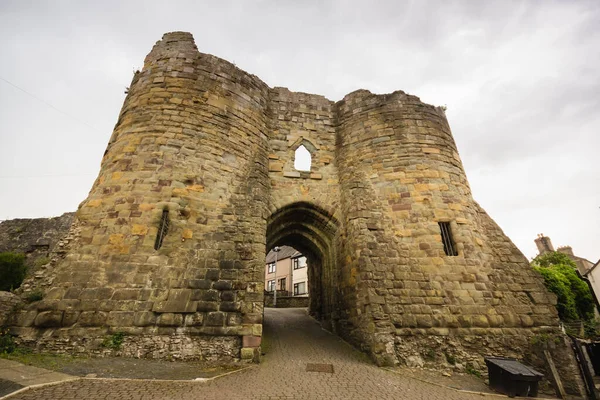 The Burgess gate house of Denbigh Castle built in the 13th century by Henry the first as part of his military fortifications to subdue the Welsh. It once formed part of the town walls and is now a scheduled ancient monument