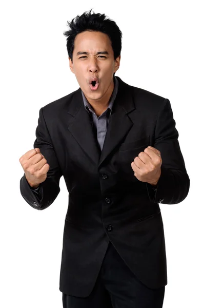 A cheerful young business man with clenched fist isolated — Stock Photo, Image