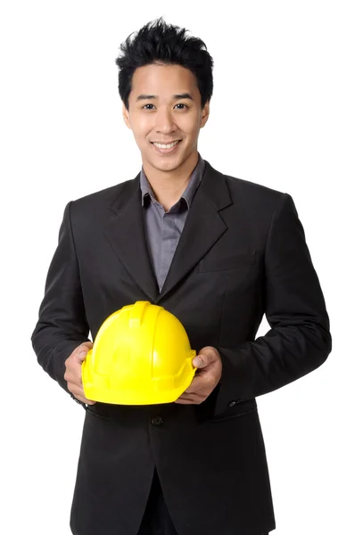 Young foreman or engineer with yellow hard hat in suit isolated — Stock Photo, Image