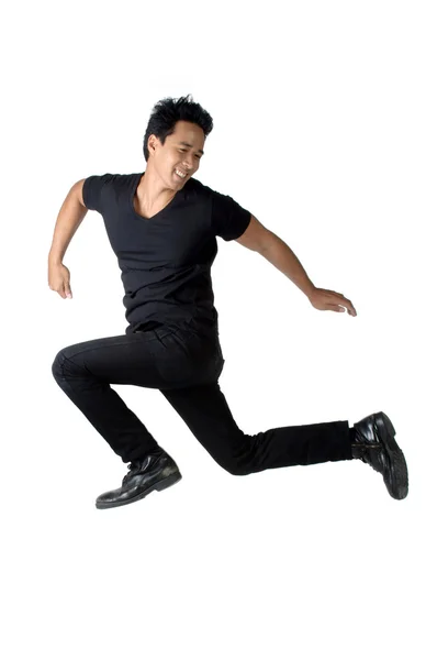 Man zwarte shirt gezegend geïsoleerd springen — Stockfoto