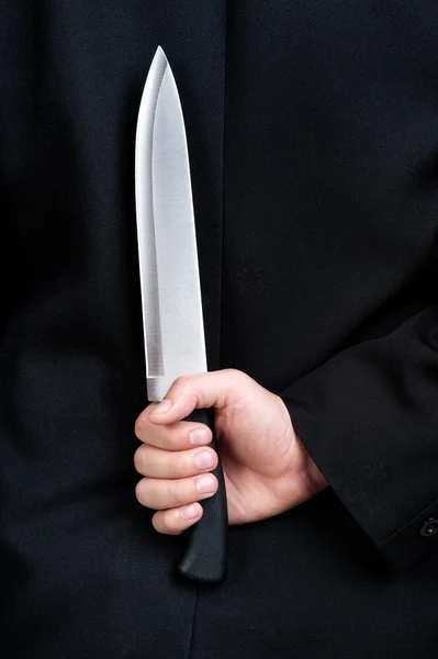 Business man Judas hold knife — Stock Photo, Image