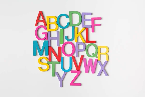 Kleurrijke Houten Engelse Letters Witte Achtergrond Kopieerruimte Voor Educatief Grafisch Stockafbeelding