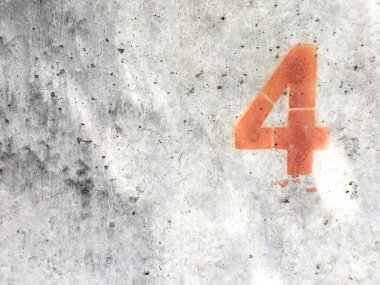 Red number four on dld dirt stains concrete wall texture background and copy space