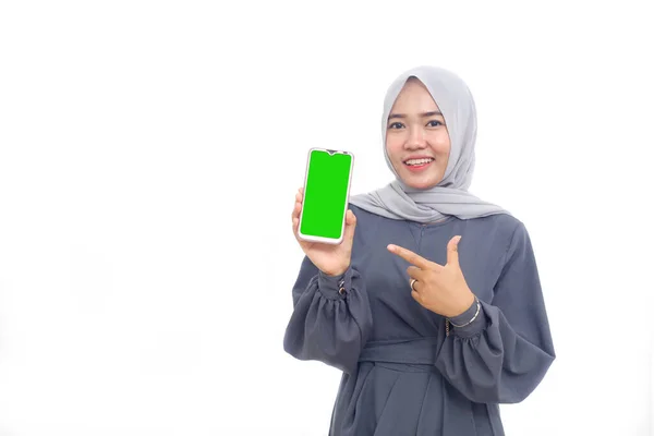 Asian Muslim Woman Pointing Her Finger Blank Mobile Phone Isolated — Stock Photo, Image