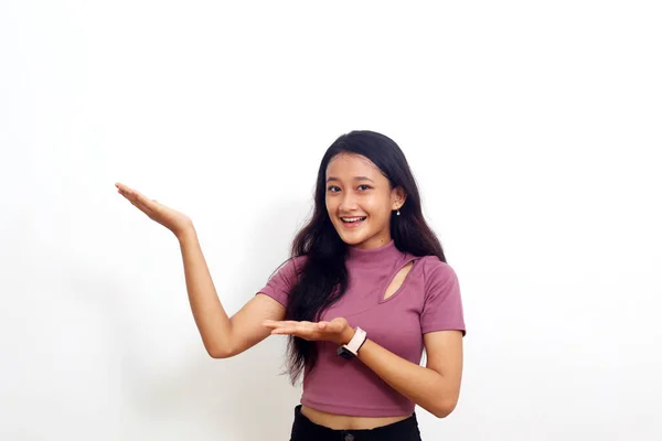 Beautiful Asian Girl Presenting Something Her Isolated White Background Copyspace — Stock Photo, Image
