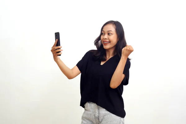 Successful Asian Young Woman Standing While Holding Cell Phone Isolated — Foto Stock