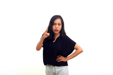 Woman threaten someone, Outraged pissed asian girl pointing camera and yelling, white background