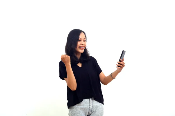Portrait Happy Young Asian Woman Celebrating Mobile Phone Isolated White — Foto Stock