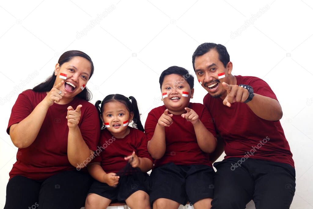 Happy asian family celebrate Indonesia Independence Day. Isolated on white background
