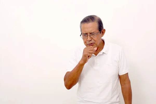 Elderly Asian Man Standing While Coughing His Fist Hand Isolated — Stockfoto