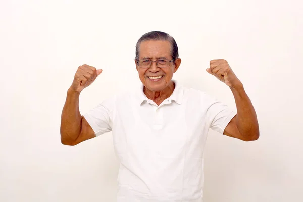 Happy Asian Old Man Standing While Showing Strong Gesture Isolated — Φωτογραφία Αρχείου