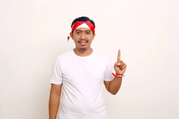 Indonesian Man Standing While Showing One Finger Independence Day Concept — ストック写真