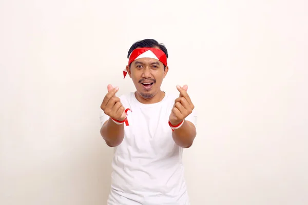 Asian Man Standing Love Finger Gesture Celebrating Indonesian Independence Day —  Fotos de Stock