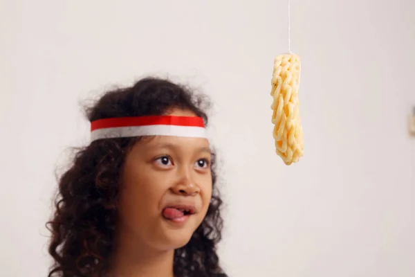 Asian Girl Celebrating Indonesian Independence Day Cracker Eating Contest Selective — Stockfoto