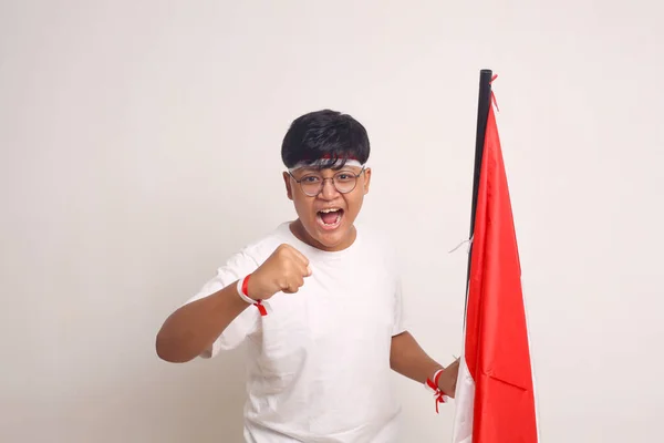 Asian Boy Holding Indonesian Flag While Clenching His Hand Independence — Foto de Stock