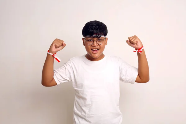 Asian Boy Showing Strong Gesture Indonesian Independence Day Concept Isolated — Stockfoto