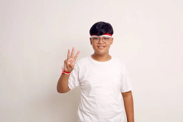 Asian Boy Standing While Showing Three Fingers Indonesian Independence Day — Foto de Stock