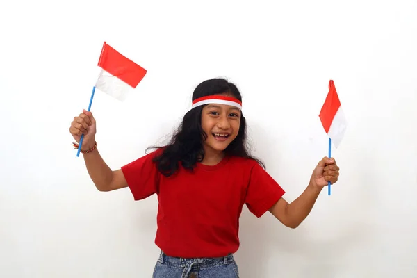 Happy Asian Girl Standing While Holding Indonesian Flag Celebrate Independence — Zdjęcie stockowe