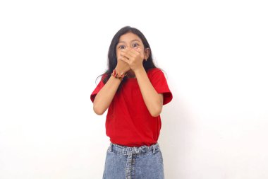 Surprised asian little girl with covered his mouth. Isolated on white background